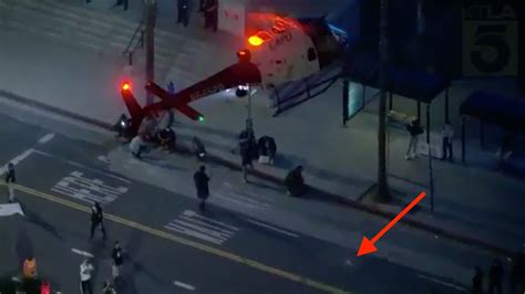 Police Helicopter Tries To Force Down Drone Amidst Protests In Los Angeles