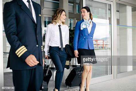 Airline Cabin Crew Walking Airport Photos And Premium High Res Pictures