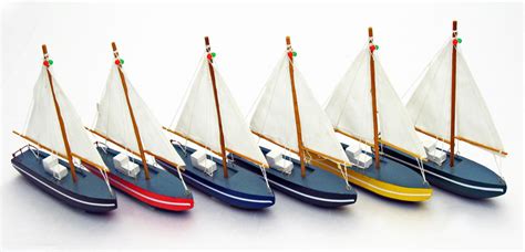 Looking for beach themed crafts and activities for your kids? Wooden Sailboat | Decorate in Style With Party Packages by ...