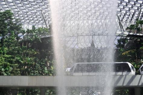See how much your amount is sgd (singapore dollar) now in rain (condensate). SINGAPORE-December 28, 2019: Jewel Changi Airport RAIN VORTEX, It`s Largest Indoor Waterfall For ...