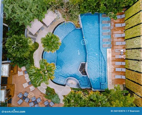 Drone View From Above At Swimming Pool Couple Men And Women In