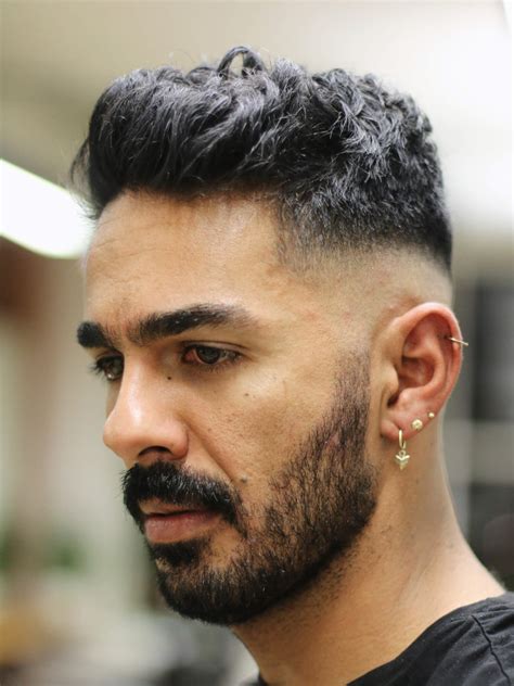It has bright colors on it: Wavy Quiff Mid Skin Fade Haircut | Style Guide - Regal ...