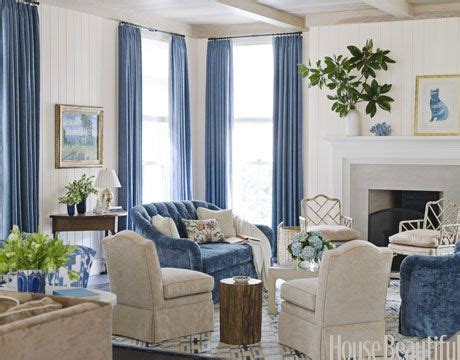 Blue accent pillows and a throw, as well as the potted plants, bring life and softness to a balcony decked in industrial metal sheeting. Go for Glossy | Traditional living room furniture, Dining ...