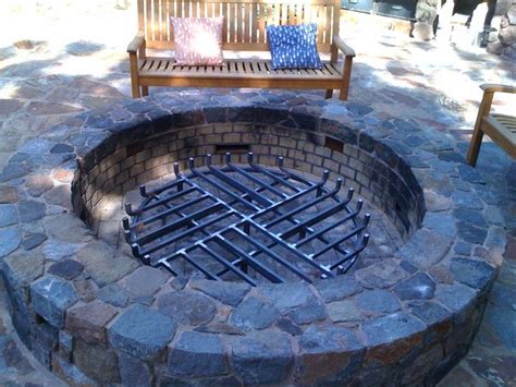 Lifetime steel grate is crafted from thick 3/4 inch solid steel rods. Custom Fire Grate - Traditional - Exterior - san francisco ...