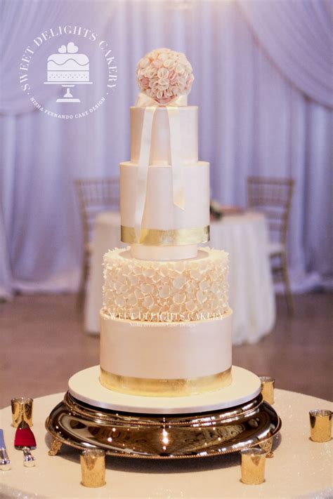 Elegant Ivory Gold Wedding Cake