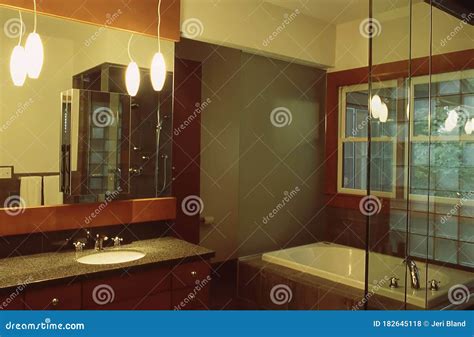 Modern Bathroom Interior With Hanging Pendant Lights Stock Photo