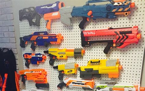 This diy nerf gun wall was seriously so easy (special thanks to my super handy husband for helping all my visions work) and i wish we would've done this long ago. Diy Nerf Gun Wall Rack / Top 10 Ways To Make Your Nerf ...