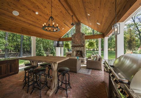 Stunning Rustic Outdoor Living Space Complete With Fireplace Grill