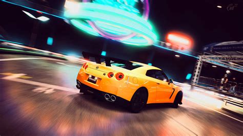 Download Yellow Nissan Gtr Sports Car In Motion Blur Wallpaper