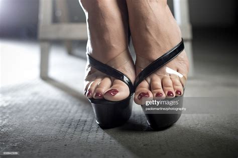 Woman Feet With Red Nail Polish On High Heels Photo Getty Images