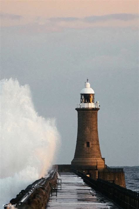 Download Premium Image Of Huge Wave Hitting A Lighthouse In Scotland