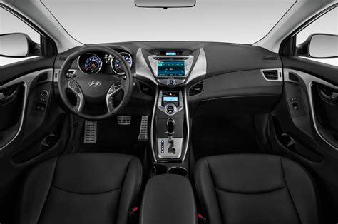 While there are some hard plastic elements here and there, they are convincingly grained to look a bit more upscale. 2014 Hyundai Elantra Coupe Reviews - Research Elantra ...