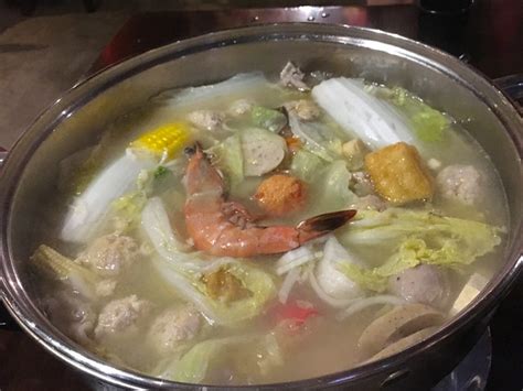 It doesn't have a set recipe, but consists of a pot of broth and a variety of ingredients which are cooked in it, then dipped in the accompanying sauce before consumption. Taifeng Taiwanese Hot Pot Restaurant • AppleFoodees