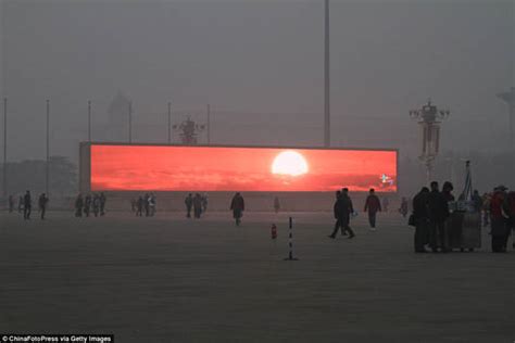 Smog Hit Beijing Shows Sunsets On A Giant Tv To Remind