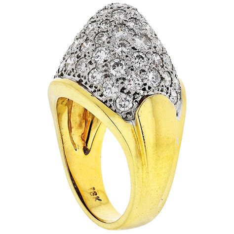 contemporary emerald and diamond 18 karat yellow gold ring for sale at 1stdibs