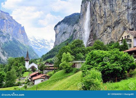 Famous Village Of Great Waterfall Lauterbrunnen In Swiss Alps Stock