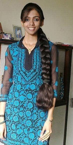 Create a loose twisted braid and decorate your hair with three white roses. Beautiful long braids | Long indian hair, Braids for long ...