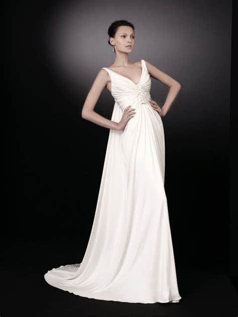 The designer peter langner was not a name to me until i went wedding dress shopping at brown's brides. Beautiful white v-neck wedding dress with gathered floral ...