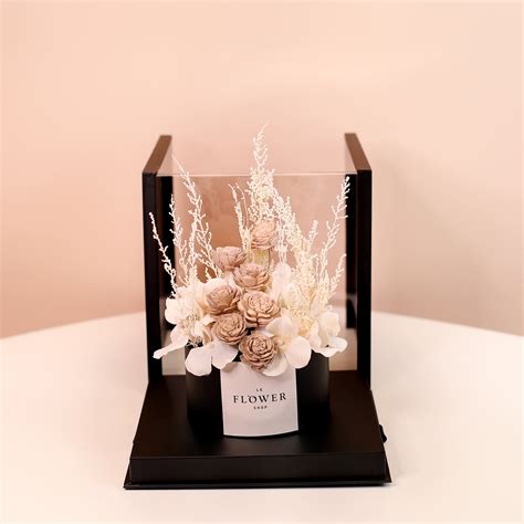 The acrylic rose collection features clear acrylic boxes that can store gifts and showcase beautiful roses. Forever Lasting Acrylic Box - Le Flower Shop