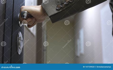 Closeup of Male Hand Unlocks a House`s Door Stock Image - Image of