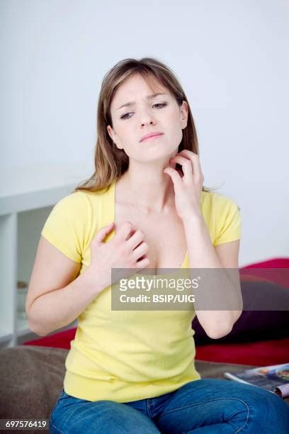 Itching Chest Photos And Premium High Res Pictures Getty Images