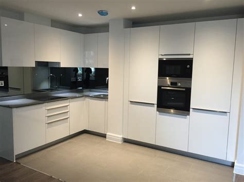 White Gloss L Shape Open Plan Kitchen Modern Kitchen London By