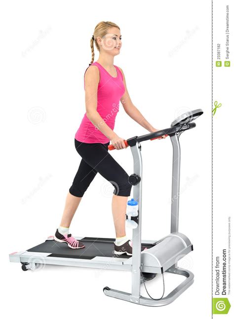 Young Woman Doing Exercises On Treadmill Stock Photo