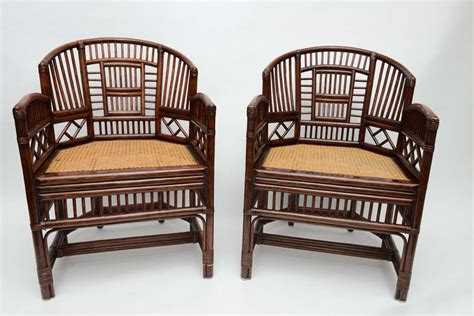 Pair of Vintage Bamboo Rattan Barrel Chairs at 1stdibs Vintage white caned barrel chair refashioned in fresh white lacquer with pink, orange and green cotton daisy pattern fabric.