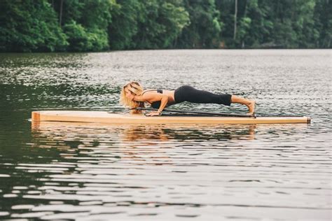 Why Stand Up Paddle Board Yoga Is The Best Summer Workout Paddle