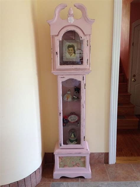 This Curio Cabinet Is Made From An Old Grandfather Clock That No Longer