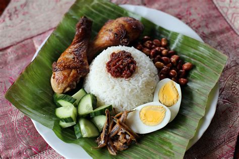 The shop which sells this dish is known as nasi lemak wanjo in kampung baru and has a history dating back to 1963, which makes it one of the oldest nasi lemak. Nasi Lemak - Ang Sarap