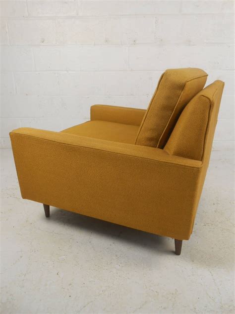An iconic set influenced by the designs of the iconic charles and ray eames lounge chair and ottoman for herman miller. Stylish Pair of Mid-Century Modern Lounge Chairs by Selig Monroe at 1stdibs