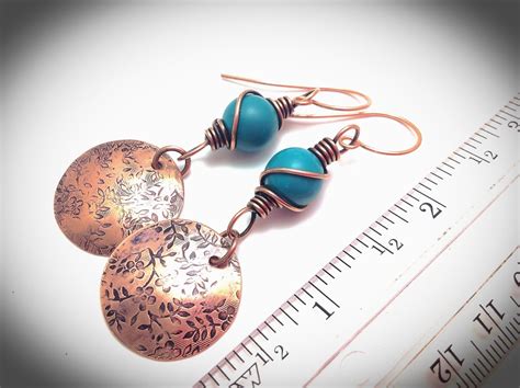 Genuine Turquoise Wire Wrapped Copper Earrings With Floral Impression