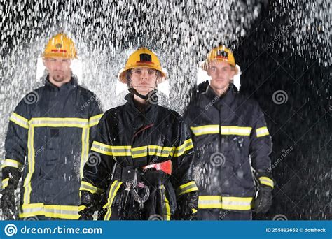Portrait Of A Group Of Firefighters Standing And Walking Brave And