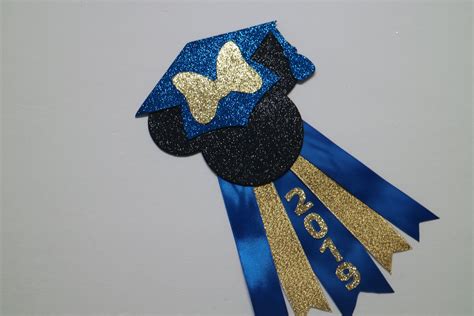 Show off denice's disney graduation gifts and other disney presents. Disney Minnie Mouse Blue Gold Graduation Corsage - Class ...