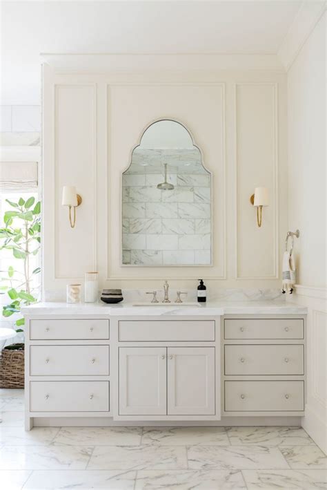 In the master bathroom of our recent pine brook home project, we used nickel on most of the finishes, the cabinet hardware, the sink, the mirror, and even the towel holder. Cabinet Hardware: How to Place Your Handles According to Studio McGee