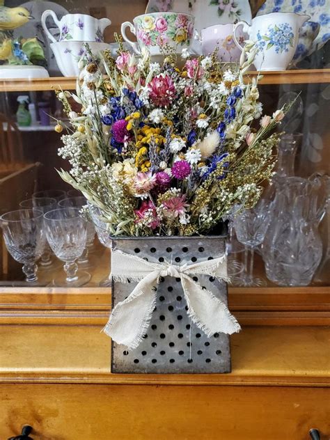 Drying flowers is a popular option for saving flowers, especially for those wanting a remove flowers from hangers and spray with unscented hairspray for protection. Dried Flower Grater Table Arrangement/Wall Hanging ...