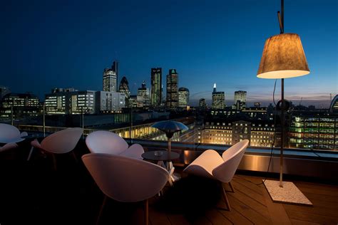 Luxurious and minimalistic furnishing with soothing views of the london skyline. Best Summer Roof Terraces in London | Roof Top Bars in London