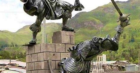 badass statue of an inca warrior fighting a spanish conquistador in maca colca canyon peru imgur