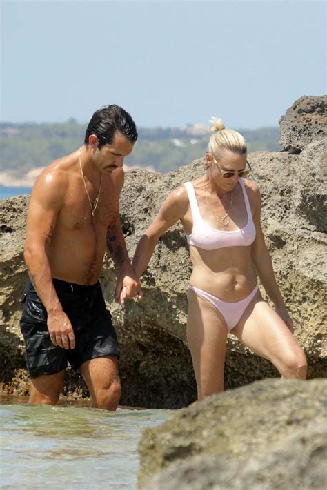 Robin Wright Spotted In A Light Pink Bikini As She Gets In Some PDA