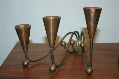Wooden candle holders lend a sophisticated and traditional look to your homemade candle creations. Mid Century American Brass and Copper Whimsical Candle ...