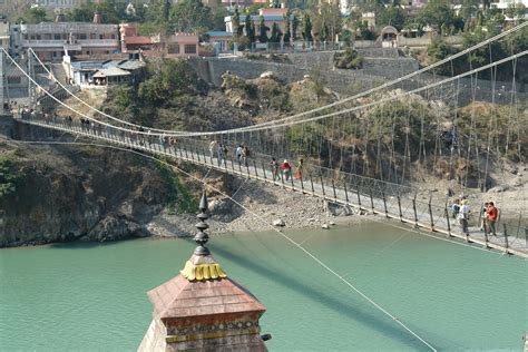 Ram Jhula Is An Iron Suspension Bridge Across The River Ganges Located