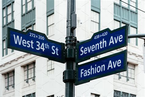 Road Signs In Midtown Of New York Featuring 34th America And American