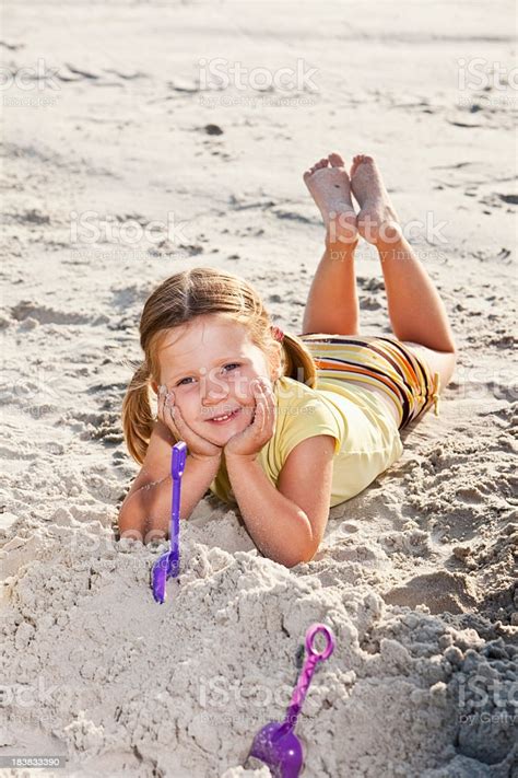 Girls playing on the beach. Cute Little Girl At The Beach Stock Photo - Download Image ...