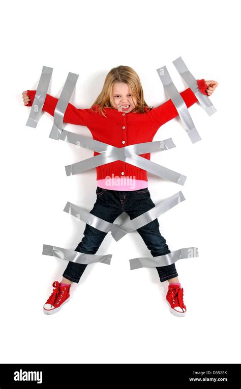 Young Girl Tied To The Wall With Duct Tape Stock Photo Alamy