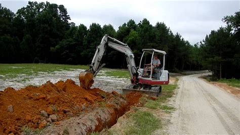 Trenching With The Mini Excavator Youtube