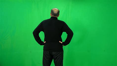 Adult Man Looks At Something In Front Of Him Green Screen Shot Stock