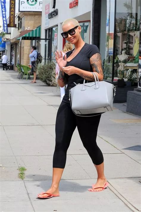 Amber Rose Flaunts Her Curves As She Climbs Out Of Her Hot Pink Jeep Mirror Online