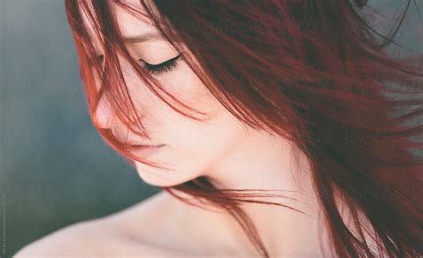 her red hair and wind by stocksy contributor alexey kuzma stocksy