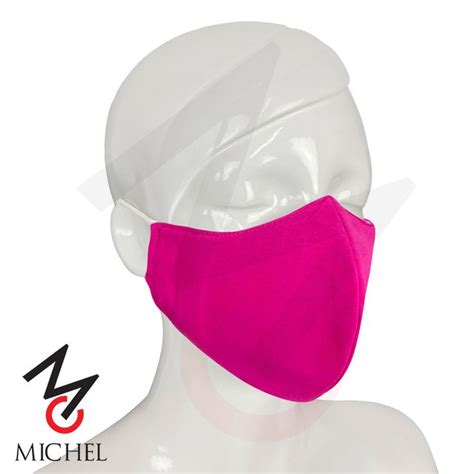 A White Mannequin Head Wearing A Pink Face Mask With The Word Michael On It